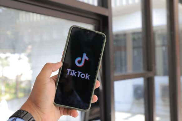 Someone opening the TikTok app on their phone